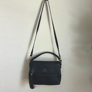 Black Kate Spade crossbody purse.